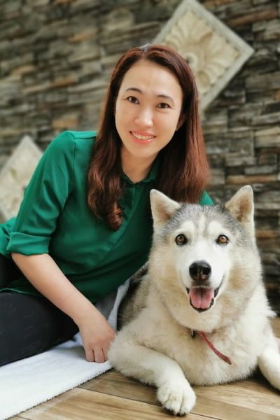 Dr Lee Wai Wai with a husky